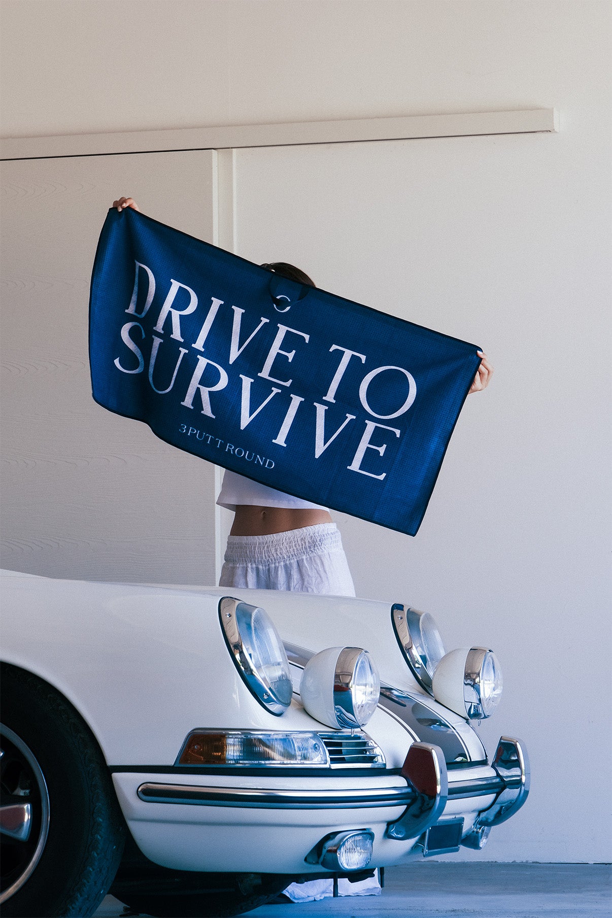 THE “DRIVE TO SURVIVE" TOUR TOWEL - 50CM x 100CM