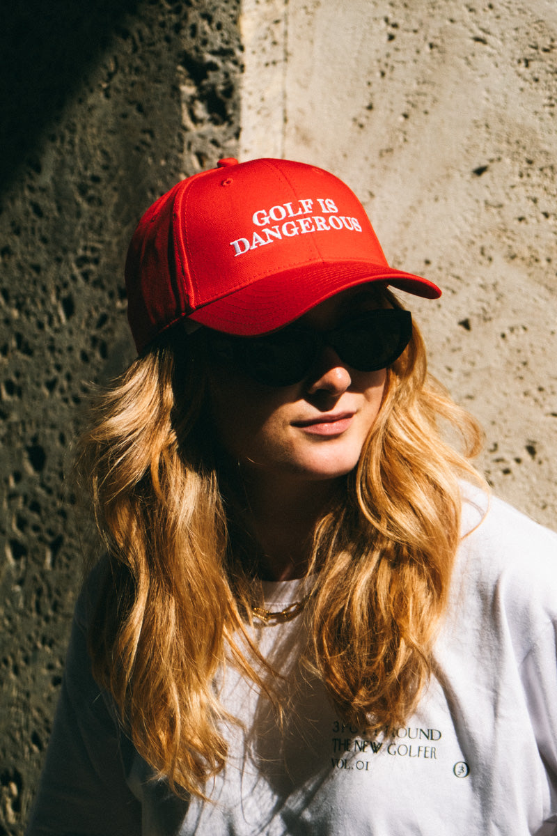 THE "GOLF IS DANGEROUS" BASEBALL CAP